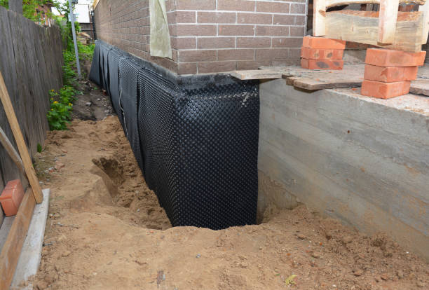 Happy homeowners after waterproofing job in Newburg
